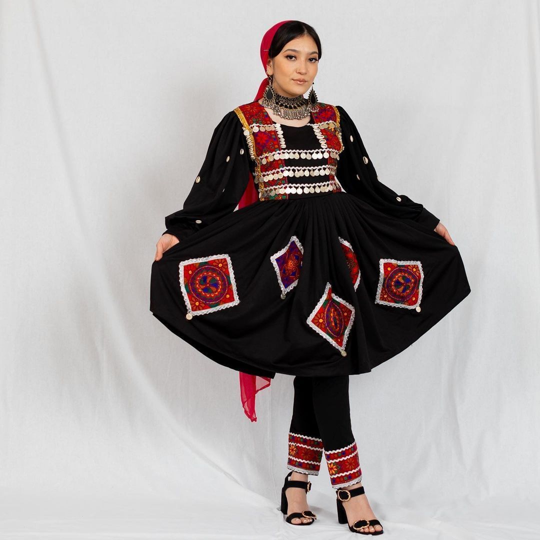 Afghani Kuchi black dress by ZGCzeenat featuring traditional Afghan embroidery, perfect for cultural events and formal occasions, combining elegance and heritage.