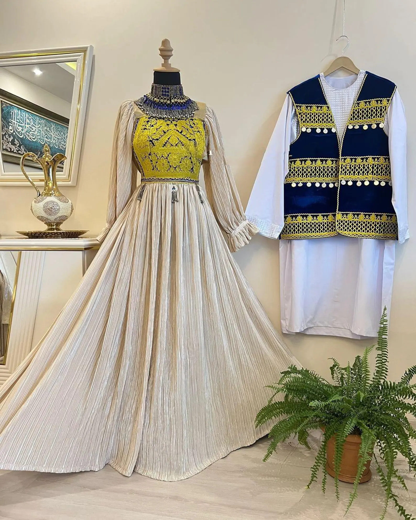 Matching Afghani couple dress set by ZGCzeenat with traditional Afghan embroidery and vibrant patterns, perfect for cultural events and celebrations.