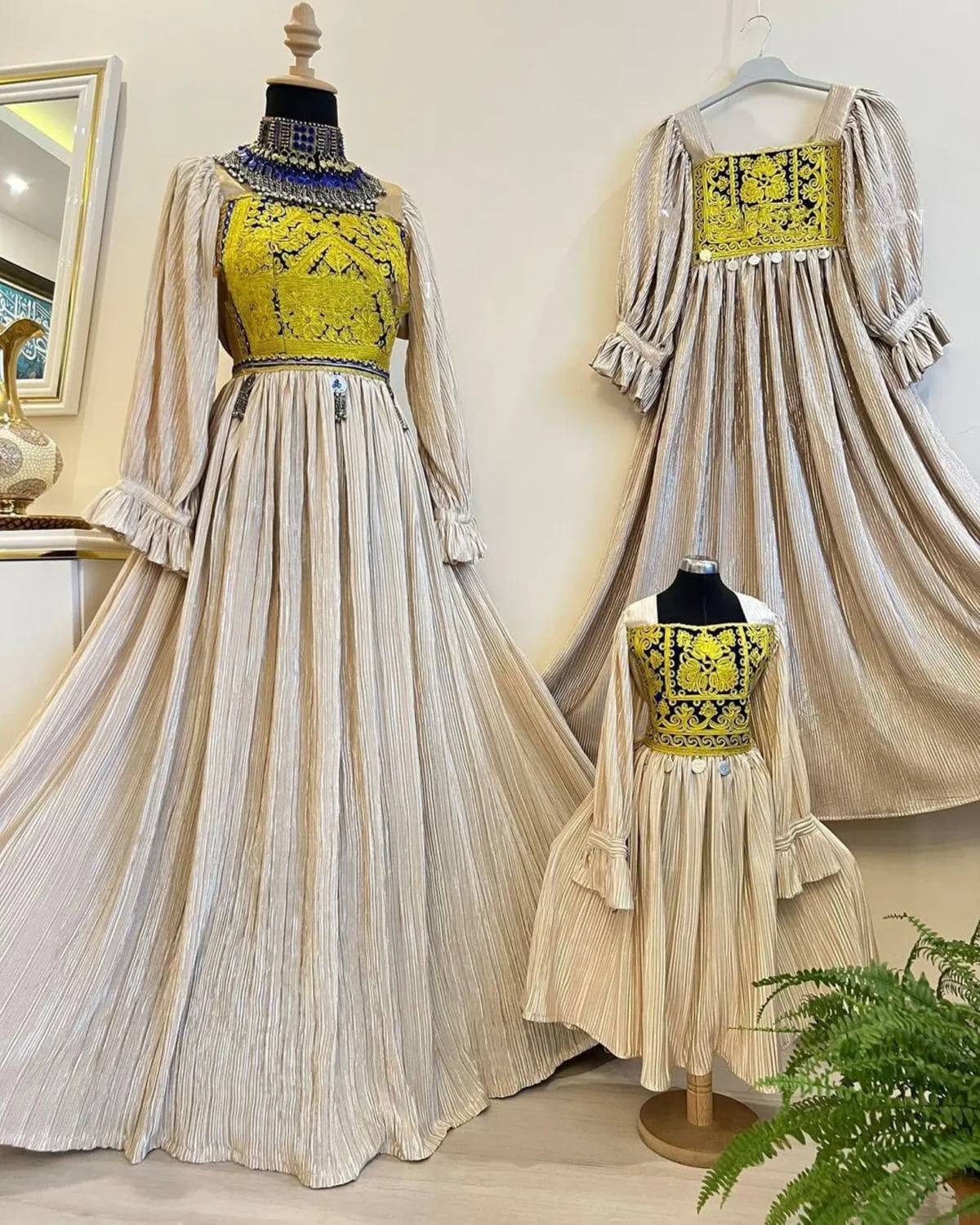 Matching Afghani couple dress set by ZGCzeenat with traditional Afghan embroidery and vibrant patterns, perfect for cultural events and celebrations.