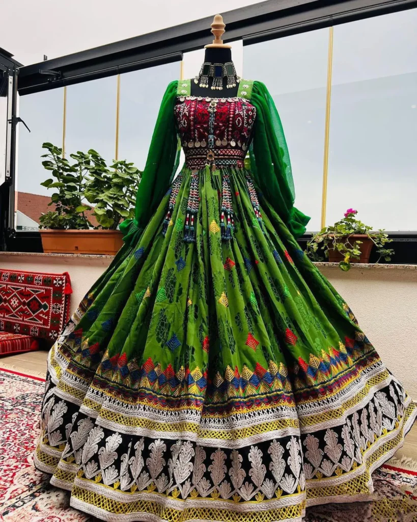 Afghani bridal green dress by ZGCzeenat with traditional embroidery, perfect for weddings and cultural events, showcasing vibrant Afghan craftsmanship.