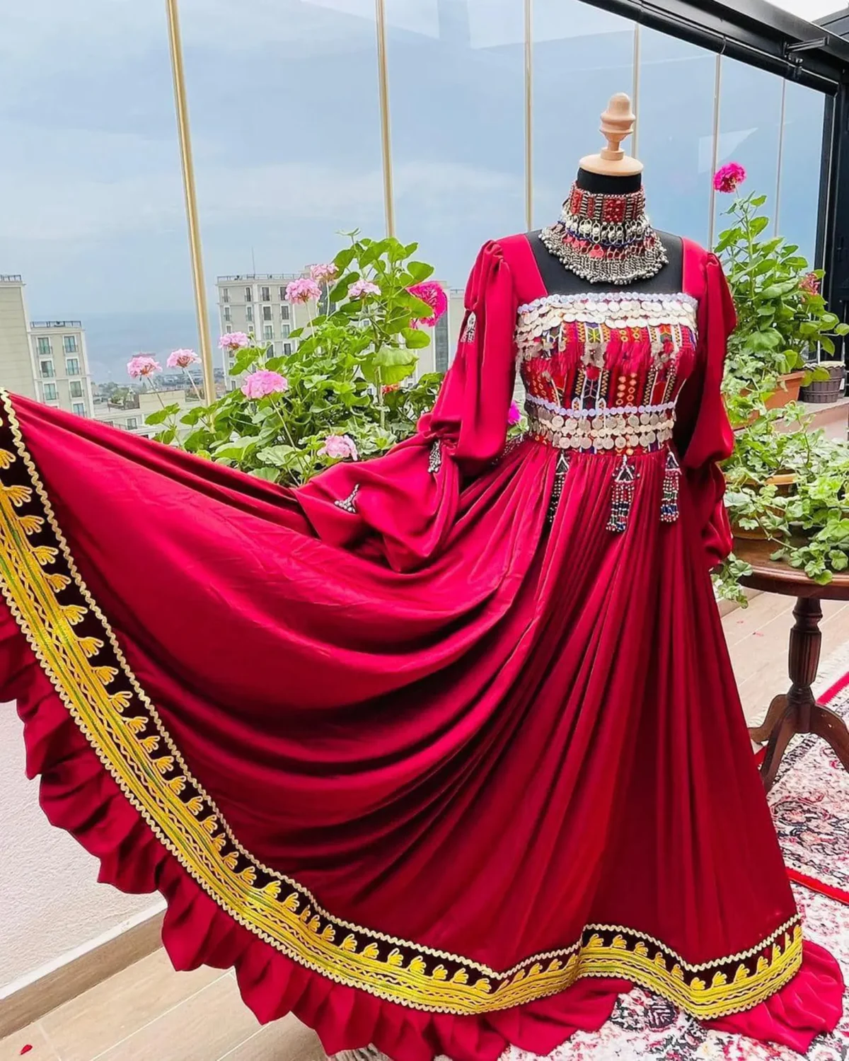 Stunning Afghani red dress by ZGCzeenat with traditional embroidery, perfect for cultural events and special occasions, showcasing Afghan craftsmanship.