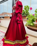 Stunning Afghani red dress by ZGCzeenat with traditional embroidery, perfect for cultural events and special occasions, showcasing Afghan craftsmanship.